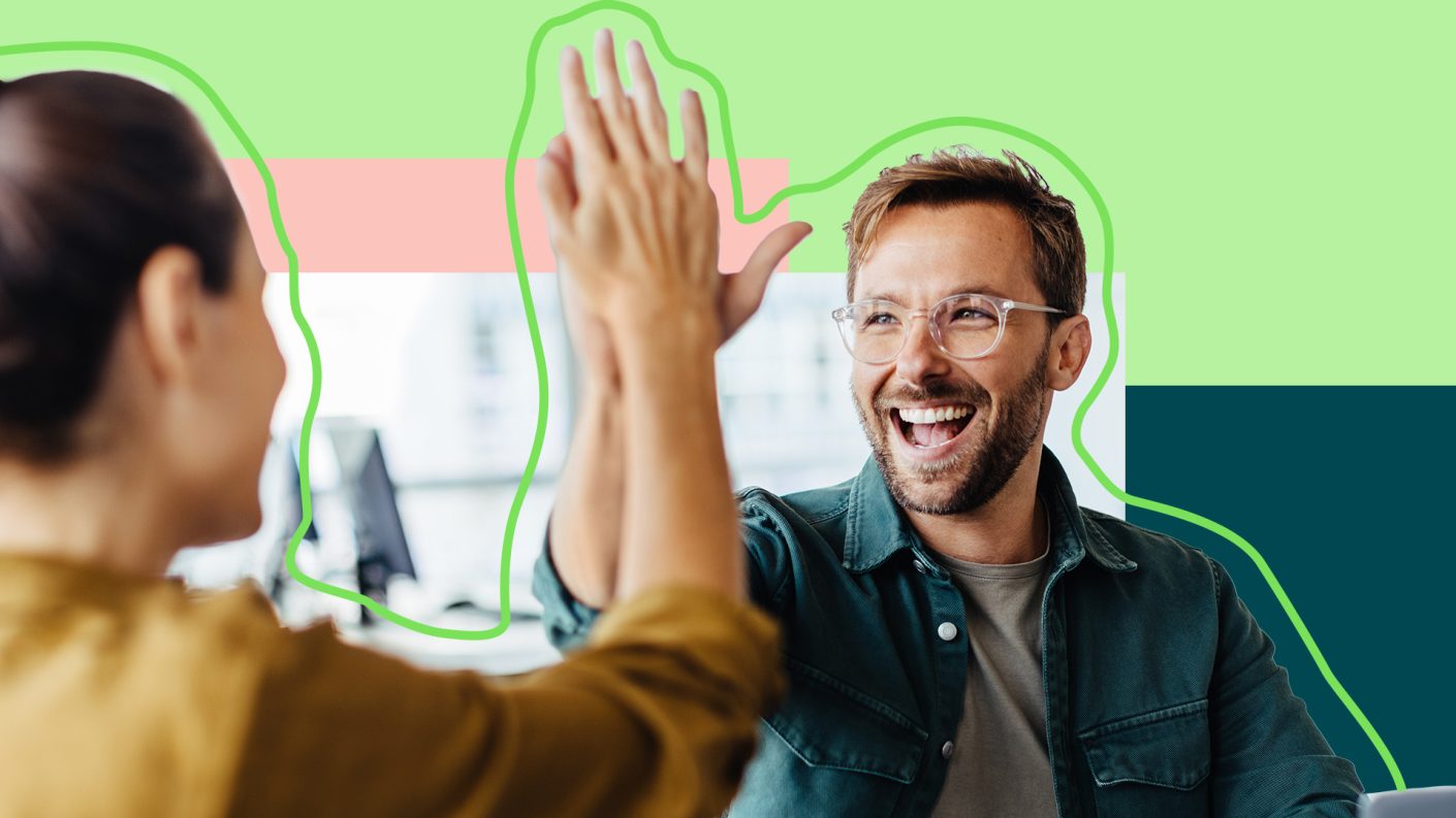 Two people giving a high five