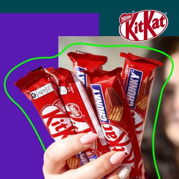Woman showing KitKat bars in her hand