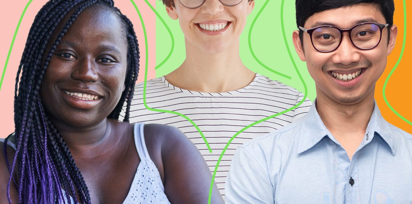 Three people with their arms crossed smiling at the camera