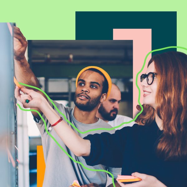 People collaborating on a whiteboard