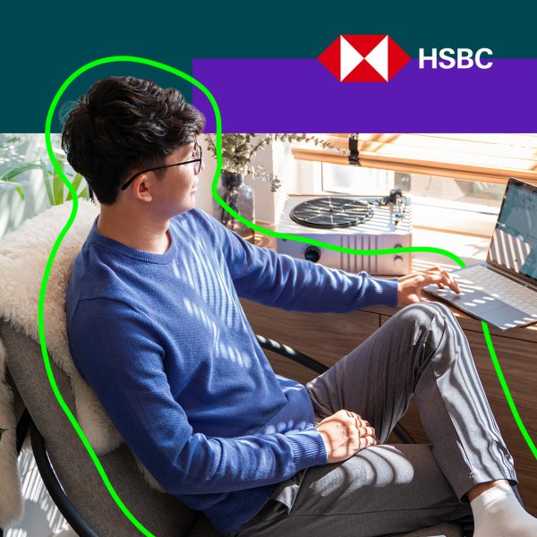 Young man looking at laptop