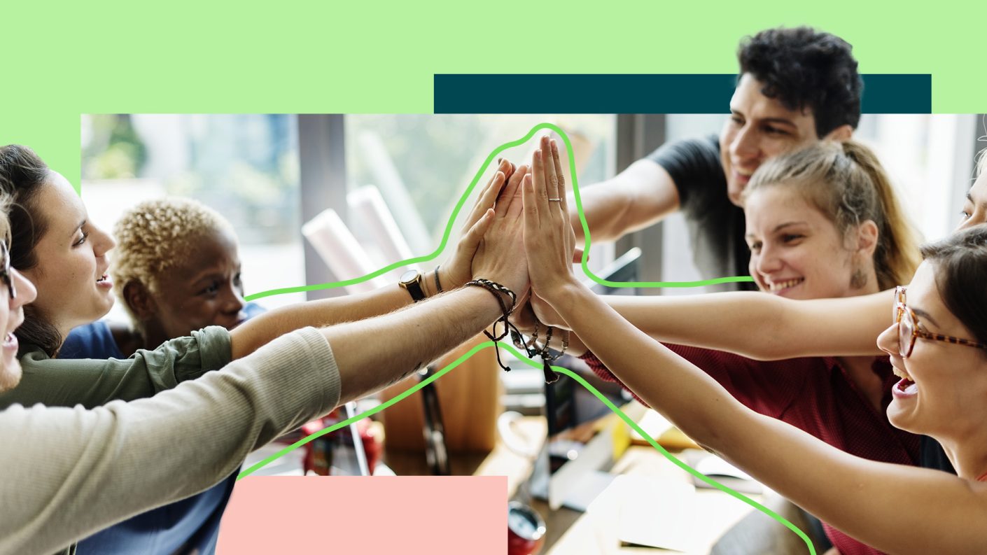 Group of diverse people giving an high five