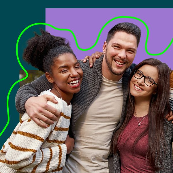 Three people hugging