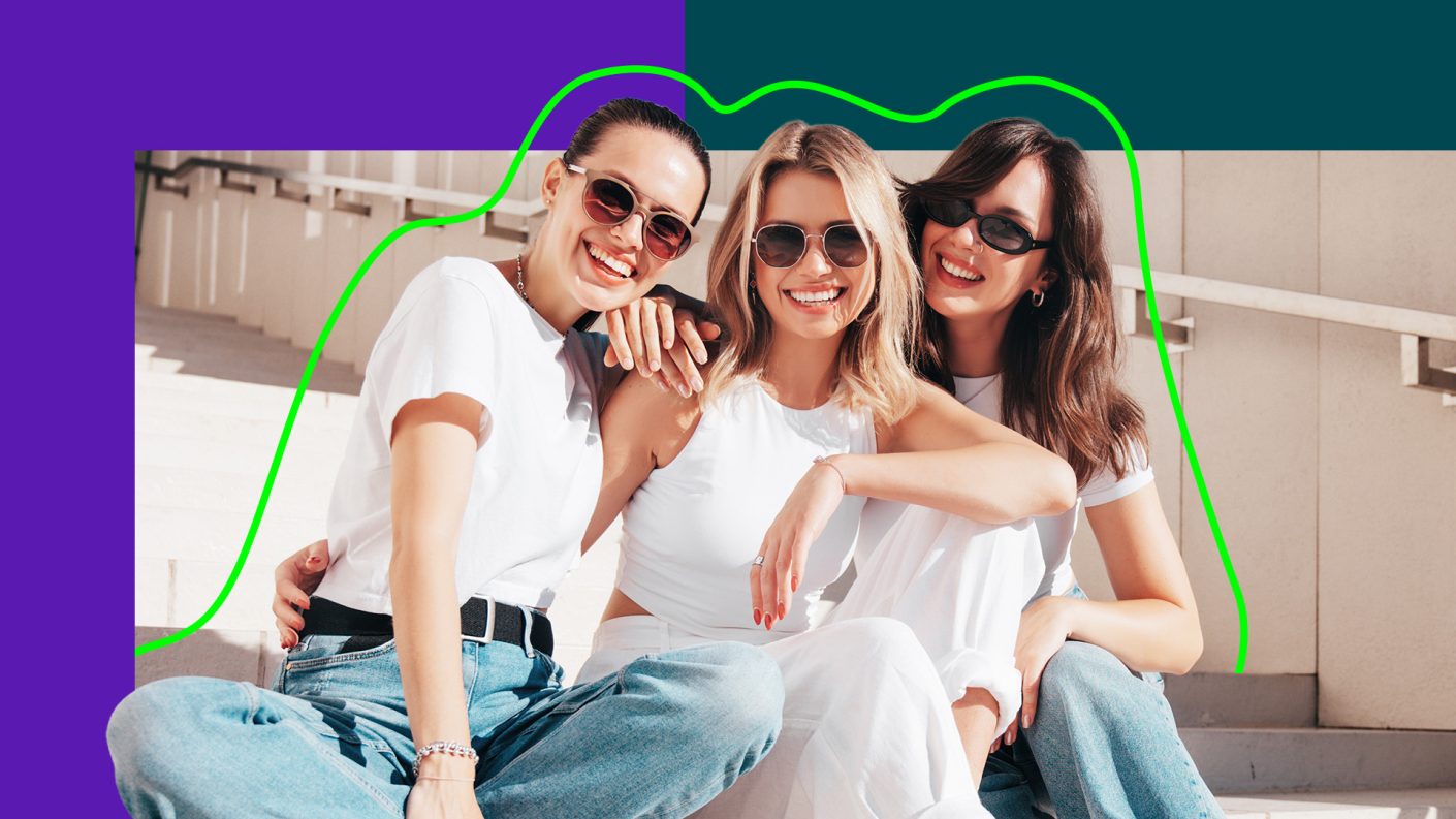Three women wearing sunglasses